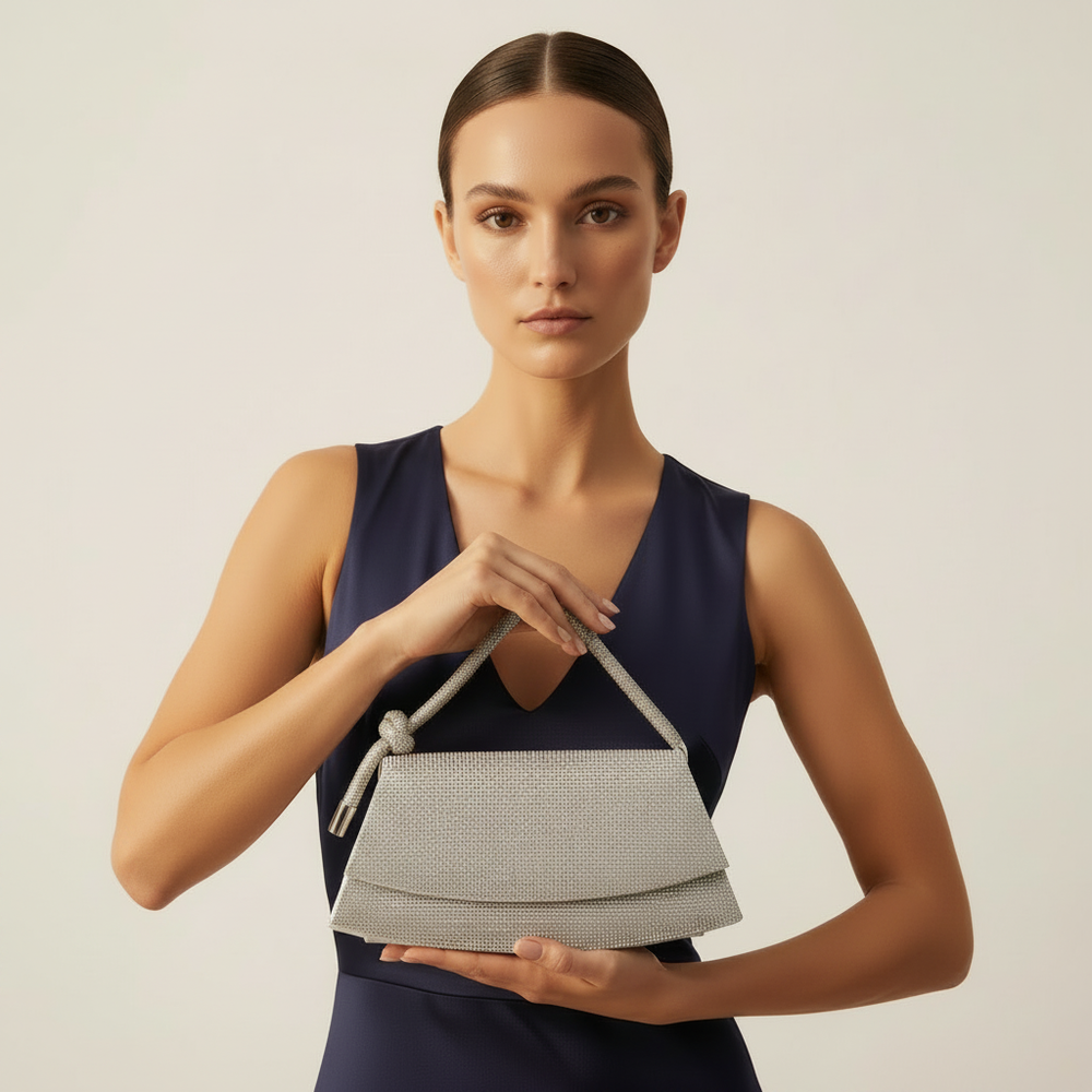 Model in navy outfit carrying LUXAI bag